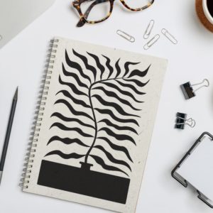 Carnet avec motif plante abstraite, pince et lunettes