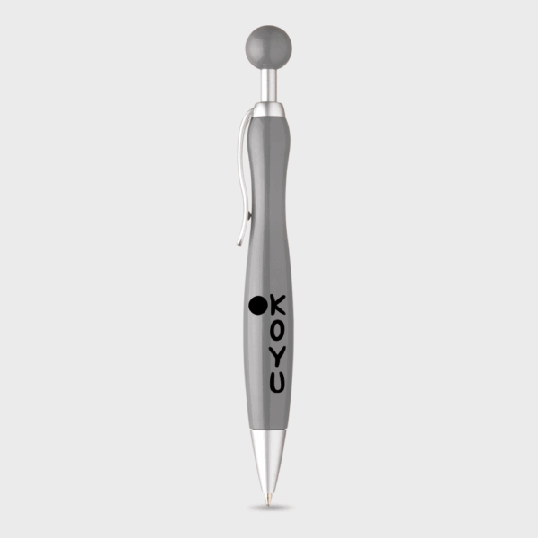 Stylo bille gris Koyu sur fond blanc.