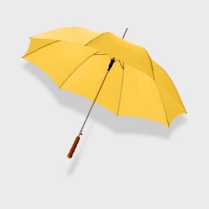 Parapluie jaune ouvert sur fond gris.