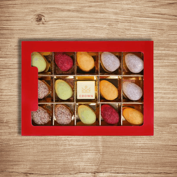 Boîte de chocolats variés assortis, présentation cadeau.