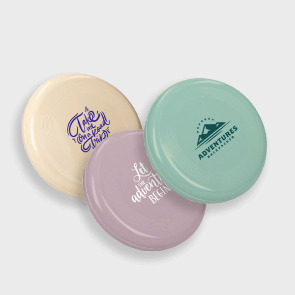 Trois frisbees colorés avec textes inspirants.