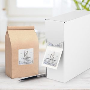 Paquet de café House Blend avec distributeur.