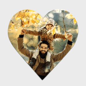 Puzzle cœur, père et enfant en automne.