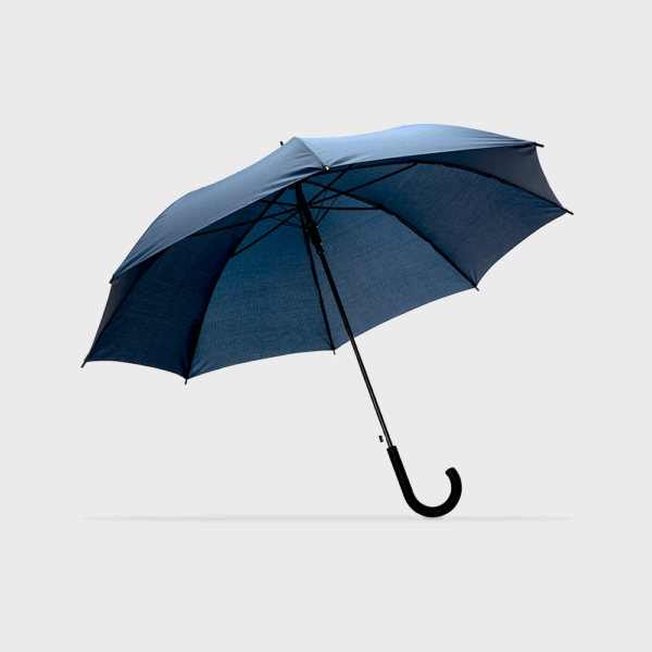 Parapluie bleu ouvert sur fond blanc.