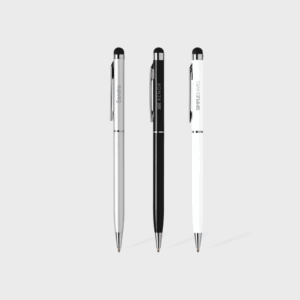 Trois stylos à bille élégants, couleurs variées.