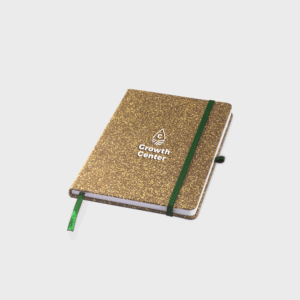 Carnet à paillettes dorées avec élastique vert.